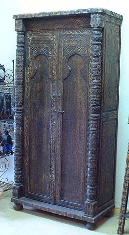 Handcarved cedar armoire